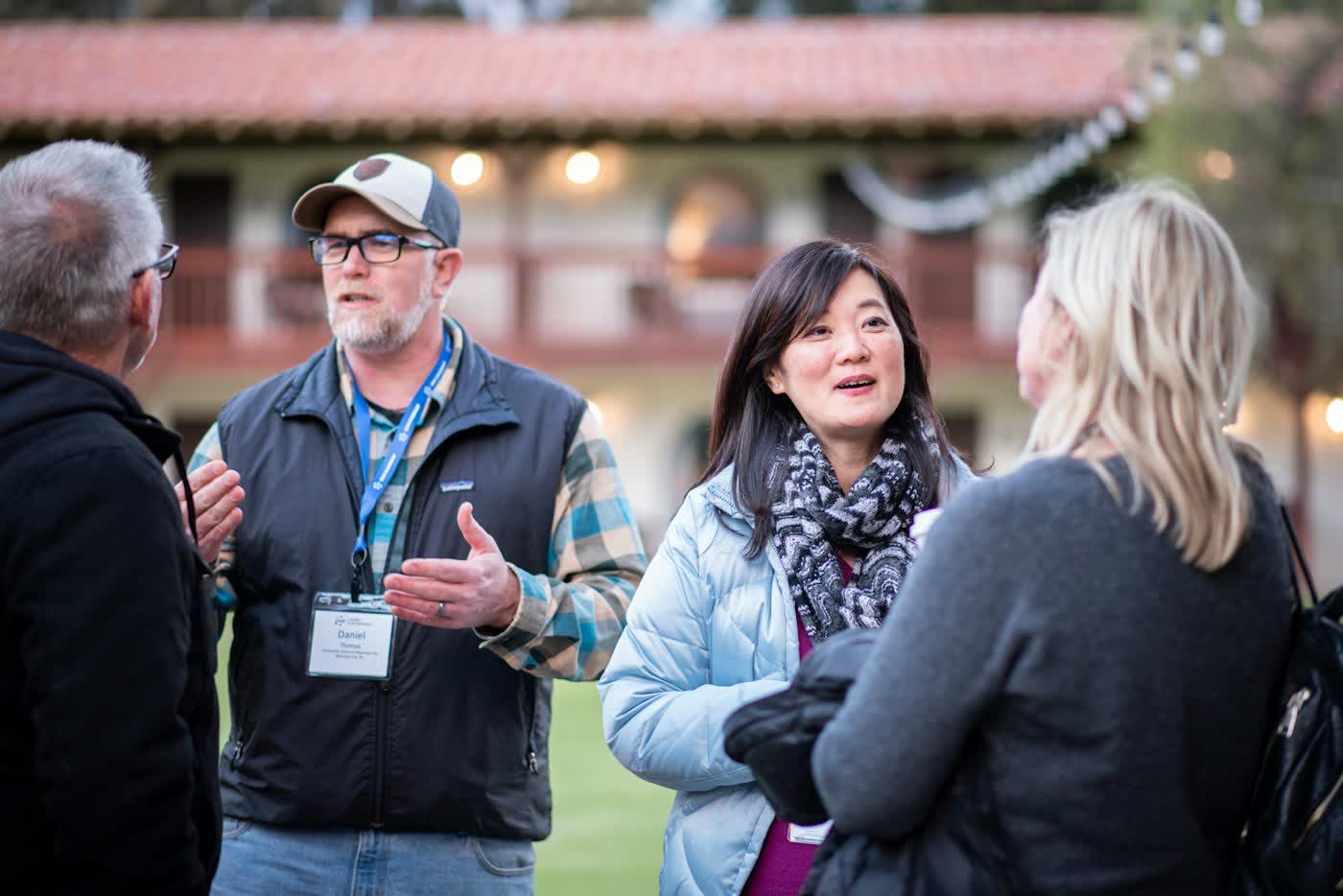 People talking together around a shared interest