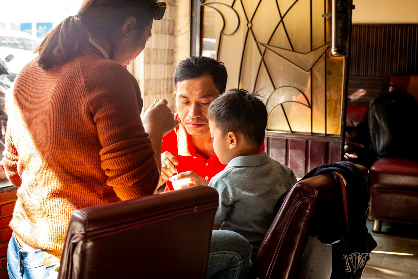 Family members discussing a marriage introduction around a table