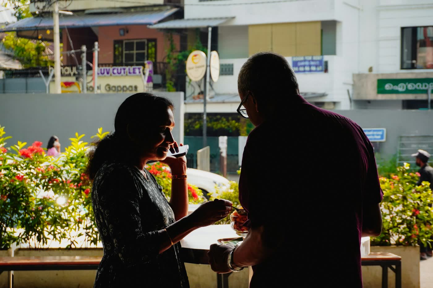 Two people talking outdoors during a first meeting