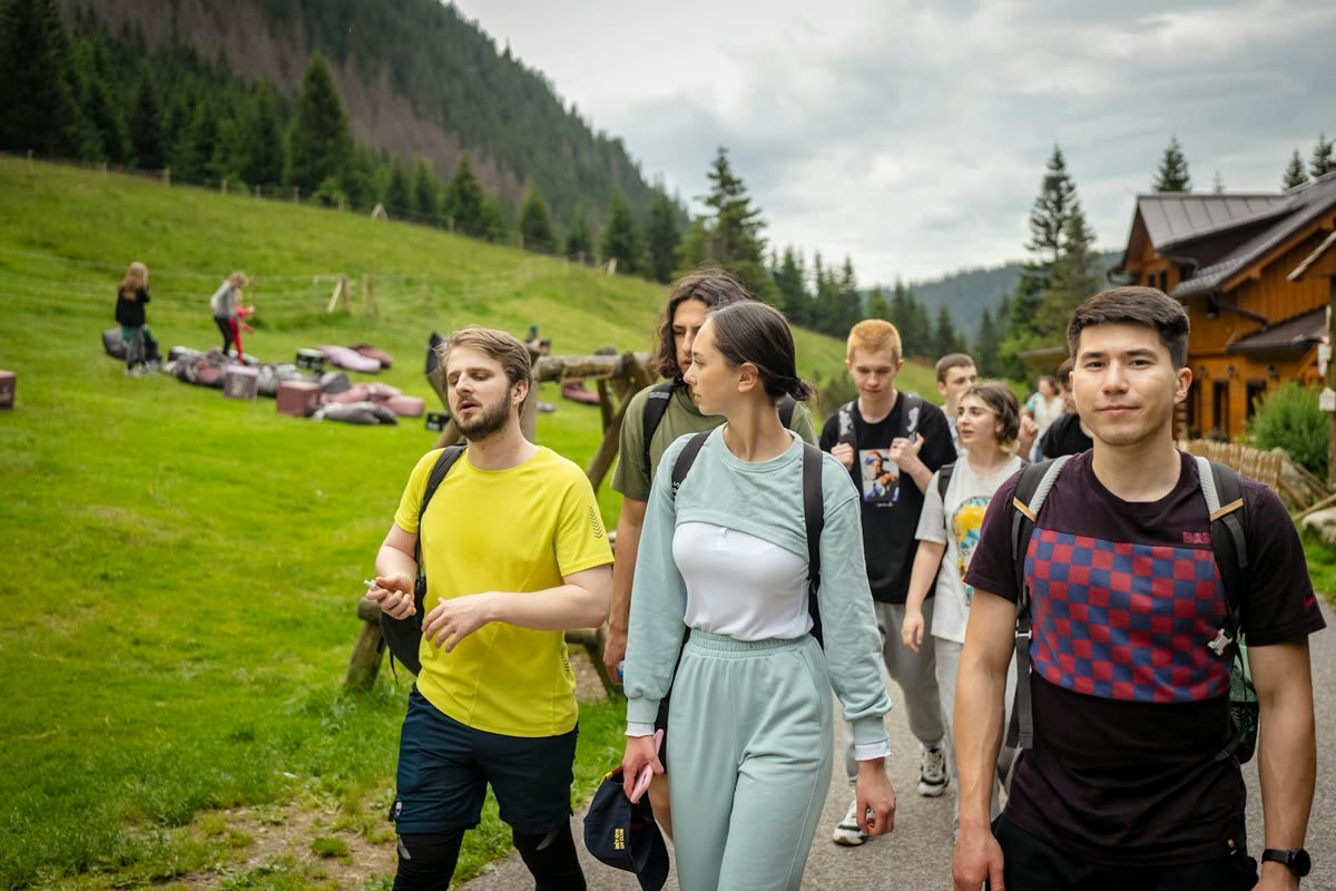 A group of travellers reviewing an itinerary together